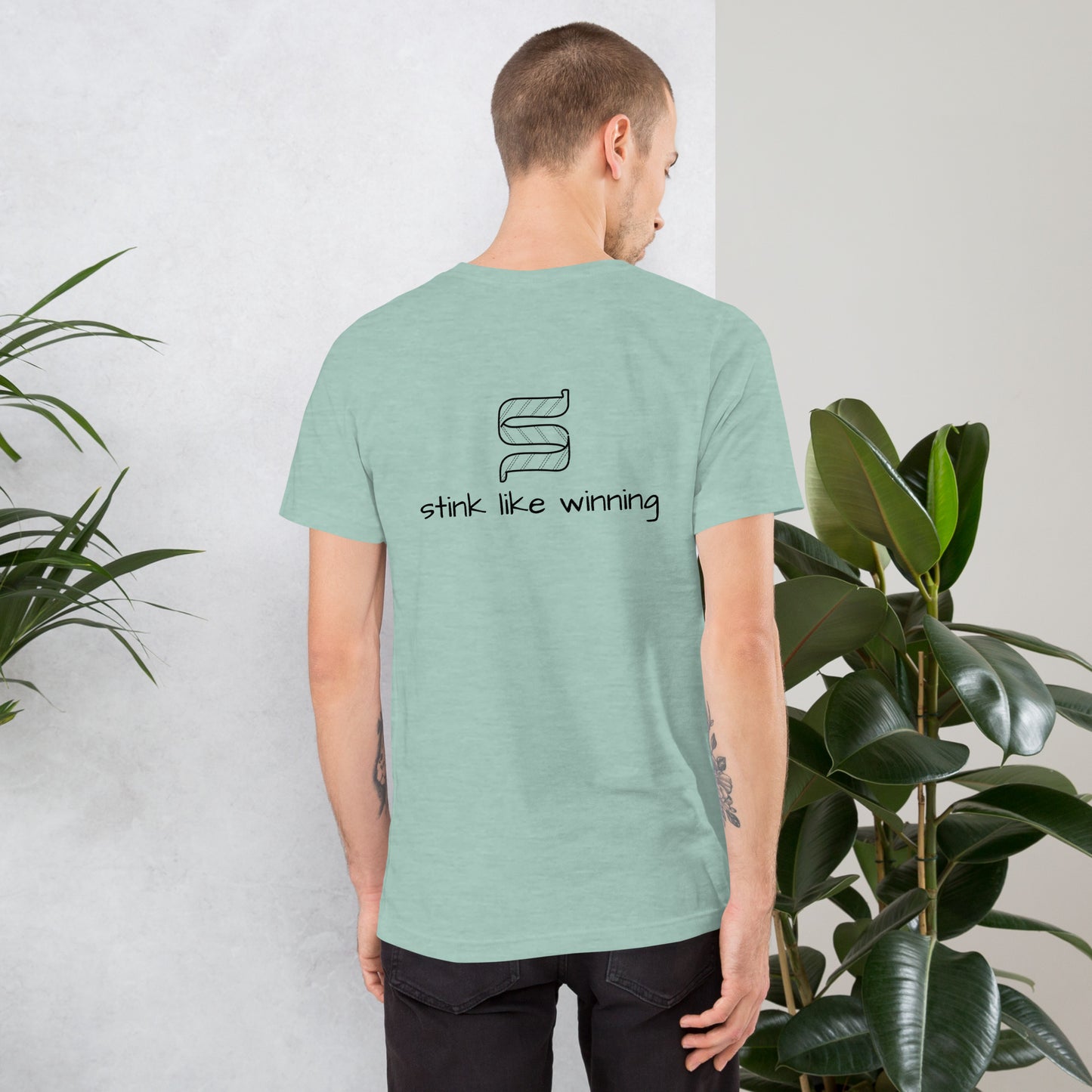 Bold statement Short-Sleeve T-Shirt for women who embrace the winning spirit with Stink Like Winning
