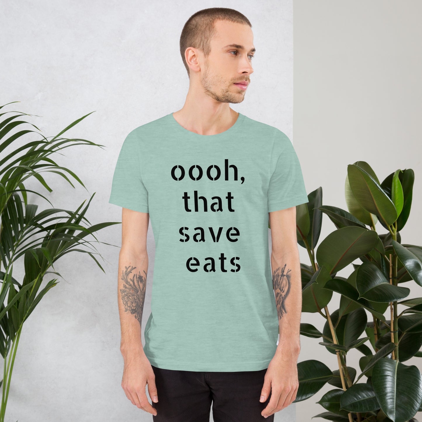 Men's Goalie Style | Stand out on the ice and off with this light-colored goalie t-shirt featuring "That Save Eats" and "Stink Like Winning