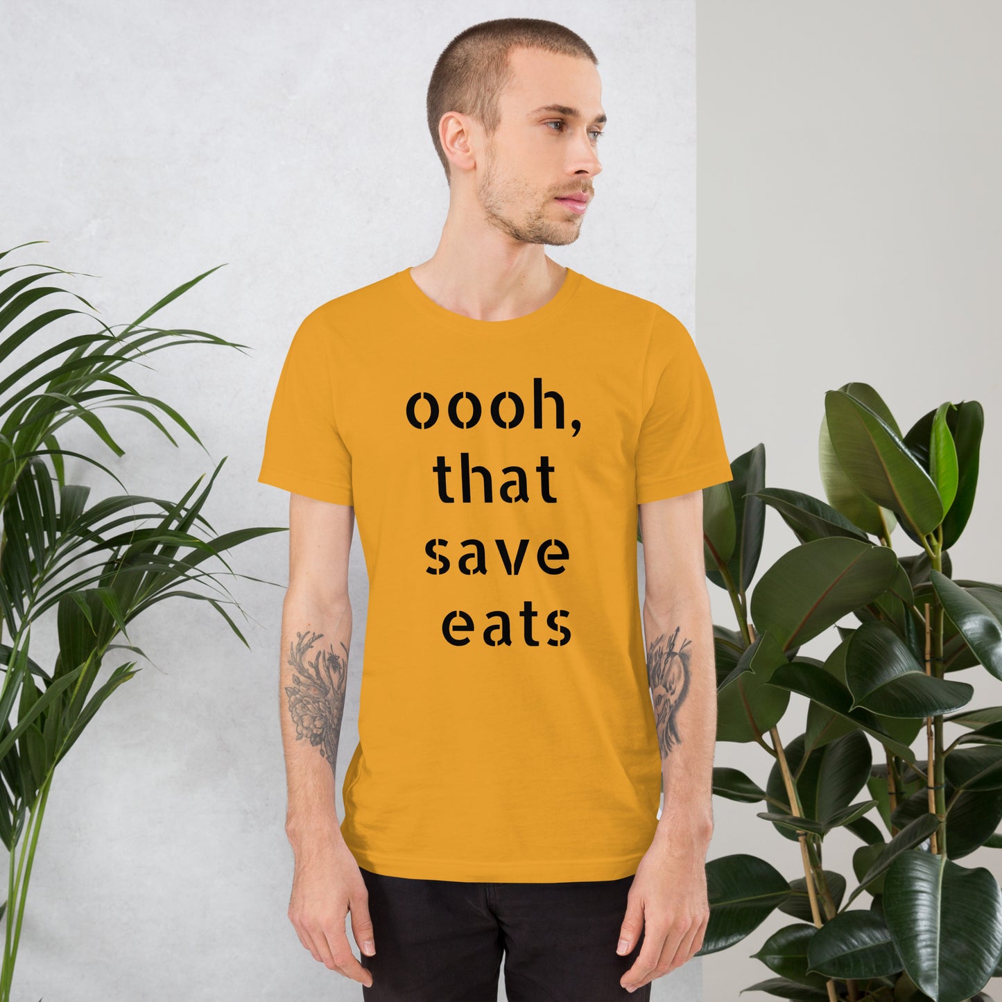 Celebrate every save and every win with this designer light colored "That Save Eats" goalie t-shirt | Stink Like Winning