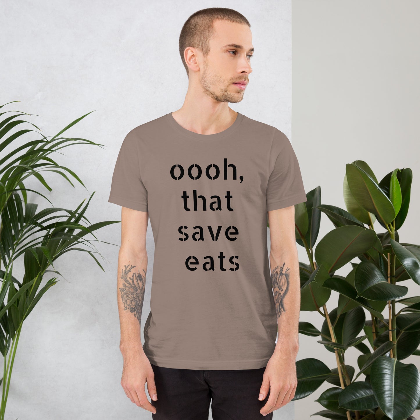 Premium Design, Winning Spirit: Light colored designer t-shirt showcasing "That Save Eats" and the "Stink Like Winning" spirit