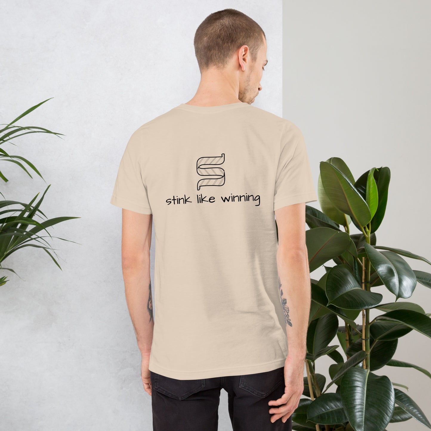 Celebrate victories in style with this light pink short sleeve t-shirt.